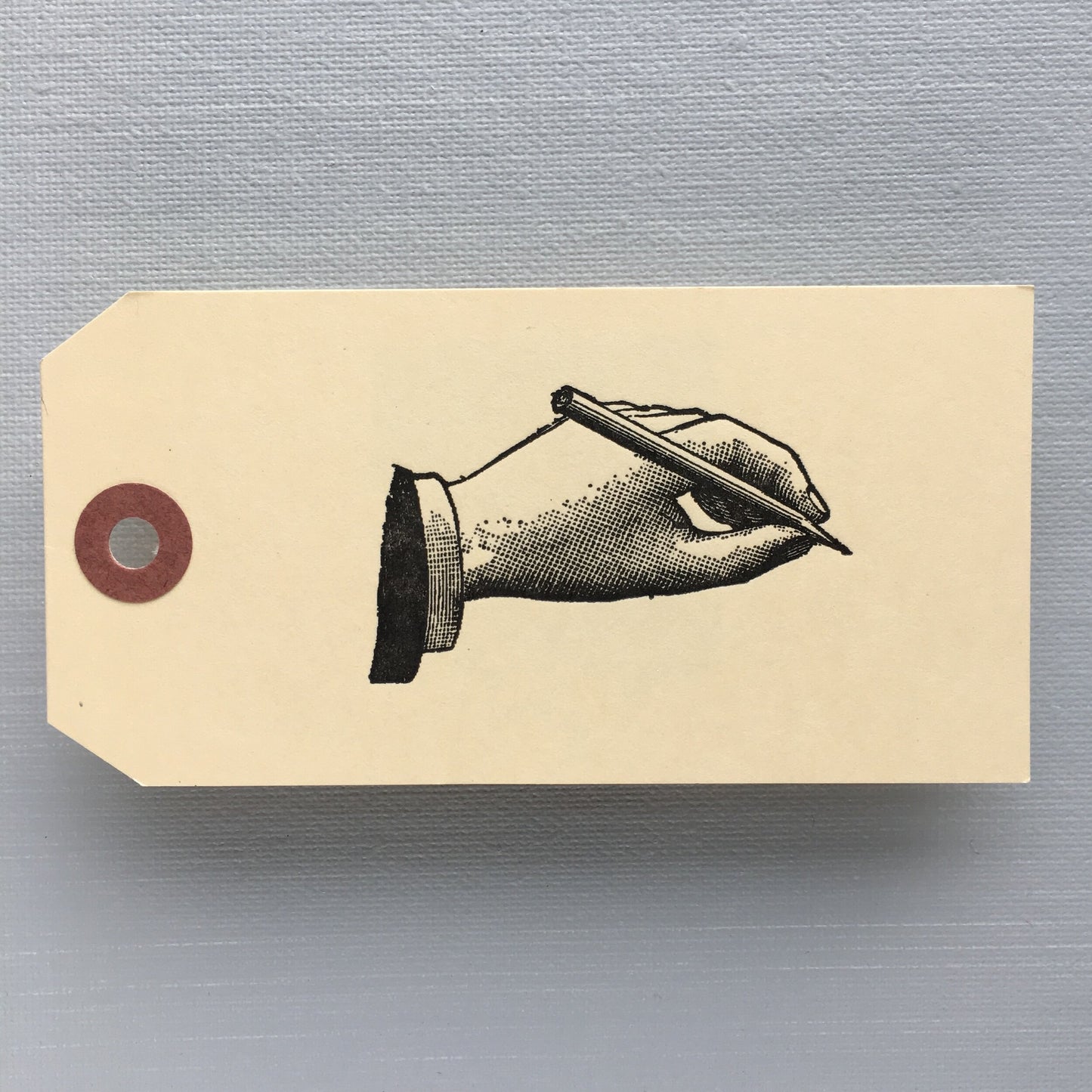 Writing Hand Tag